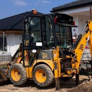 foto JCB 1CX doky 4lyzki widly 3t mini koparko-ladowarka